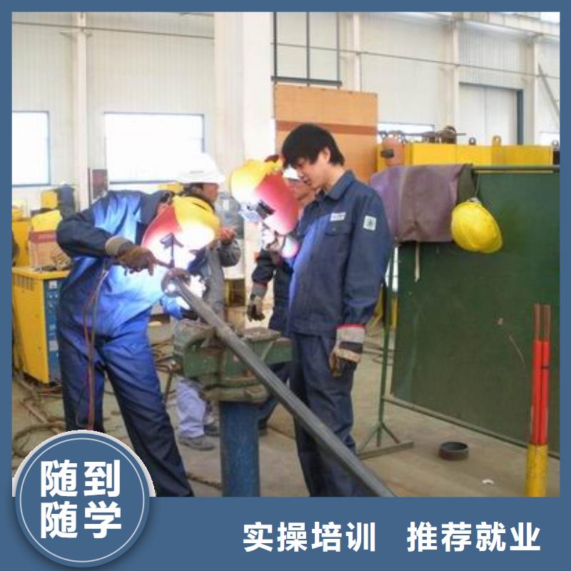 到虎振技校学电气焊实训车间大设备好
